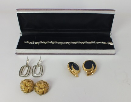 A SELECTION OF MONET COSTUME JEWELLERY to include a bracelet with simulated diamonds, and three
