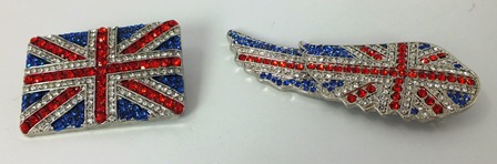 TWO BUTLER & WILSON PASTE LAPEL BROOCHES, one fashioned as a Union Jack, the other as a wing with a
