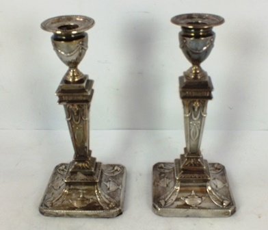 WILLIAM NEALE LTD A PAIR OF SILVER CANDLE STICKS each having detachable bead sconce, squared