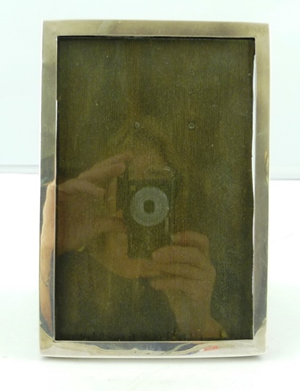 MAKER`S MARK OBSCURED A PLAIN SILVER PHOTOGRAPH FRAME, Birmingham 1920, 21cm x 14cm