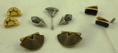 A PAIR OF ART DECO BLACK HEMATITE CLIP EARRINGS AND MATCHING PIN, together with THREE OTHER PAIRS