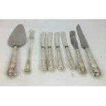 A MISCELLANY OF SILVER HANDLED QUEENS PATTERN CUTLERY comprising; a cake knife, bread knife, four