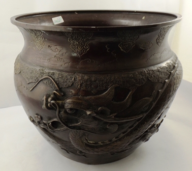 A LATE 19TH/EARLY 20TH CENTURY JAPANESE BRONZE JARDINIERE repousse worked in relief with a dragon - Image 4 of 5