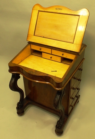 A VICTORIAN WALNUT DAVENPORT having pen box top and slope front, later green skiver, four flank - Image 2 of 3