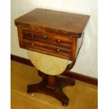 A LATE GEORGIAN/EARLY VICTORIAN ROSEWOOD AND MAHOGANY WORK TABLE having foldover top enclosing