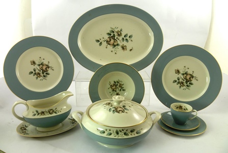 A ROYAL DOULTON BONE CHINA DINNER SERVICE ""ROSE ELAGANS"" comprising twelve dessert/soup bowls,