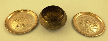 A PROBABLE INDIAN SILVER COLOURED METAL REPOUSSE DECORATED BOWL, 11cm diameter, together with TWO