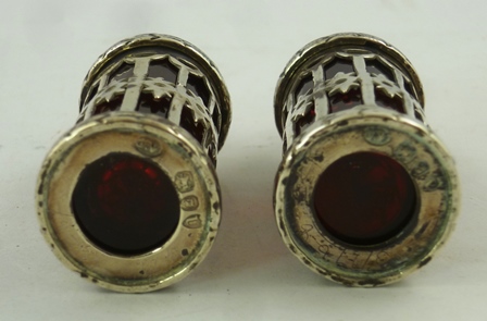 A PAIR OF OVAL VICTORIAN SILVER SALTS with garland decoration, three odd spoons and a pair of ruby - Image 3 of 5