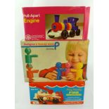 A 1970`s FISHER PRICE FIRE ENGINE in original vendor`s box, a Rosedale Educational pull apart Engine