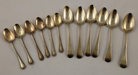 RICHARD TURNER A SET OF SIX SILVER TEASPOONS, Old English pattern with period E.L. monograms,