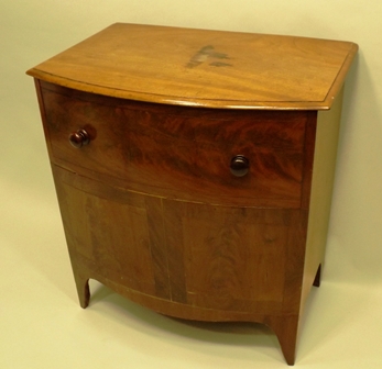 A 19TH CENTURY MAHOGANY FINISHED BOW FRONT LIFT-UP COMMODE on slender plain feet, 70cm x 66cm - Image 2 of 2