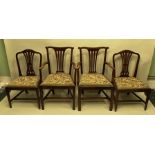 A PAIR OF EARLY 19TH CENTURY MAHOGANY DINING CHAIRS each having a hump crest rail, fan splat, drop-