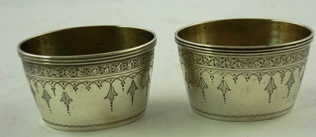 A PAIR OF OVAL VICTORIAN SILVER SALTS with garland decoration, three odd spoons and a pair of ruby - Image 4 of 5