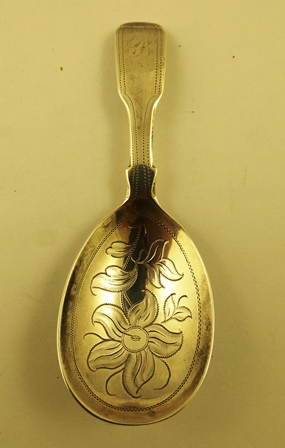 JAMES BEEBE A GEORGE IV SILVER CADDY SPOON having bright cut decoration and fiddle pattern handle,