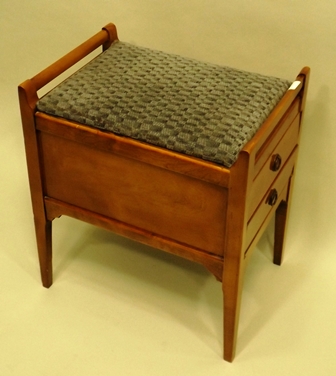 A 1970`s MAHOGANY PIANO STOOL having upholstered seat, twin plain handles, end drawers, raised on - Image 3 of 3