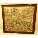 TWO LARGE HAND PAINTED INDONESIAN FESTIVAL PICTURES, in carved wooden frames