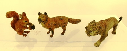 IN THE MANNER OF BERGMAN A SUITE OF THREE COLD PAINTED BRONZE ANIMAL FIGURES, Fox 6 x 11.5cm, Tiger