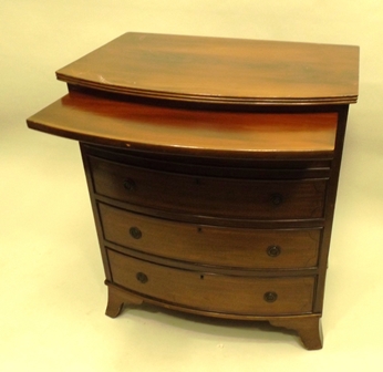 A 1960`s/70`s GEORGIAN STYLE MAHOGANY BOW FRONTED CHEST having brushing slide, four graduated long - Image 2 of 3