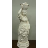 A BELLEEK PORCELAIN FIRST PERIOD PARIAN FIGURINE of a basket carrying female in multi-layered attire