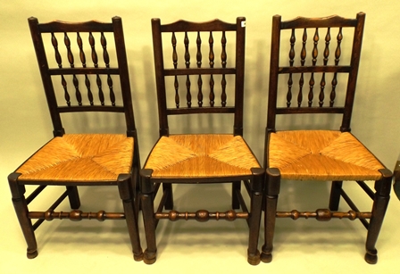 A SET OF SIX SUFFOLK STYLE ELM & ASH DINING CHAIRS each having a spindle back, rush seat, turned - Image 2 of 3