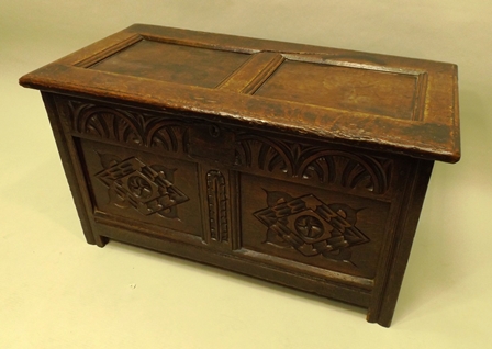 A PART 18TH/19TH CENTURY OAK COFFER having two panel top with moulded edge, raised on stile feet - Image 2 of 3