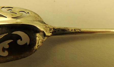 J** W** A GEORGE III SILVER MOTE SPOON having ornamental fretted bowl, makers mark only - Image 3 of 3