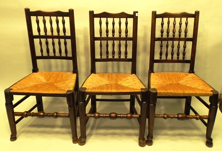 A SET OF SIX SUFFOLK STYLE ELM & ASH DINING CHAIRS each having a spindle back, rush seat, turned - Image 3 of 3
