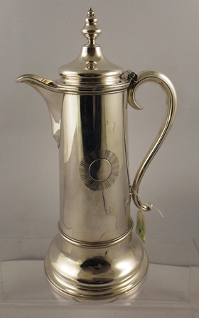 BARNARD FAMILY A SILVER FLAGON having hinged lid with finial, tapered and ringed body and scroll