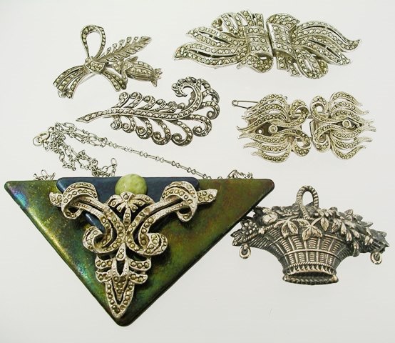 A BOX OF VARIOUS VINTAGE MARCASITE JEWELLERY to include double clips and Deco pendant