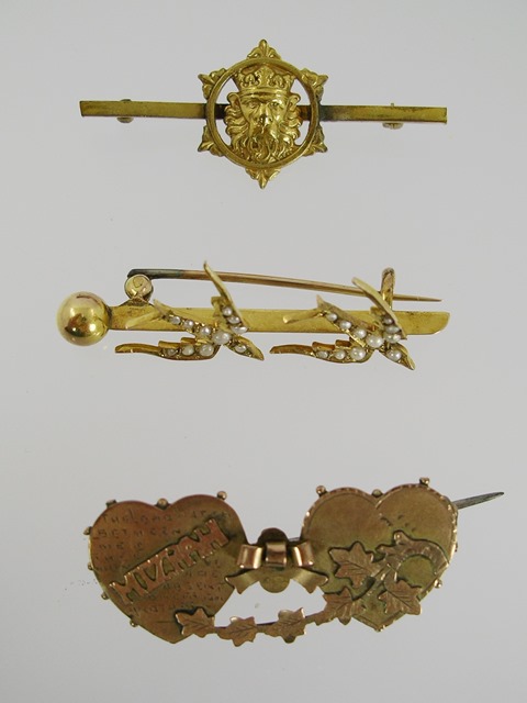 THREE VICTORIAN/EDWARDIAN GOLD BAR BROOCHES, one with twin swallows set seed pearls, one  with