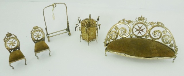 FOUR PIECES OF MINIATURE FOREIGN SILVER COLOURED METAL CABINET FURNITURE, comprising a sofa with