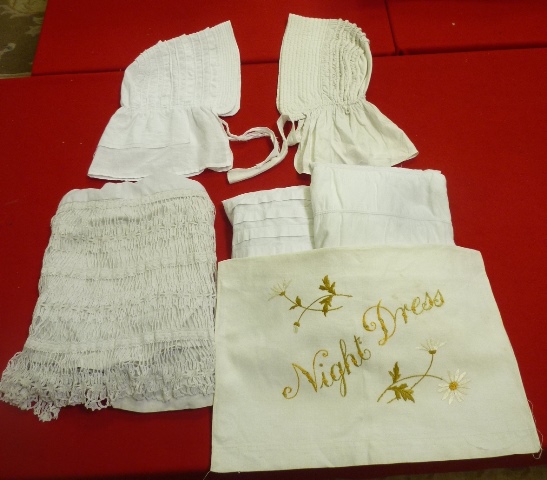 A SELECTION OF VICTORIAN AND LATER NIGHT WEAR comprising; 2 caps, 3 skirts, 3 night shirts and a