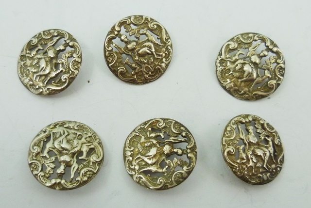 THOMAS WHITE A SET OF SIX SILVER BUTTONS, each cast and fretted with dogs, deer and figures,