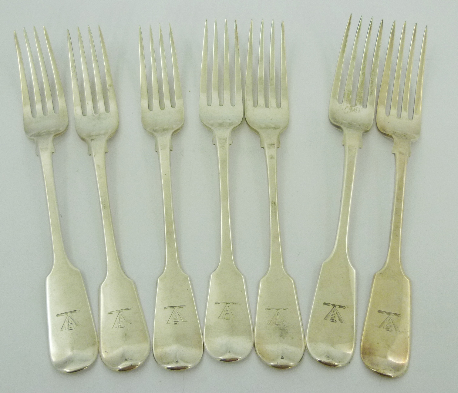 WILLIAM ELEY & FEARN A SET OF SIX MIXED GEORGIAN AND VICTORIAN SILVER FIDDLE PATTERN TABLE FORKS,