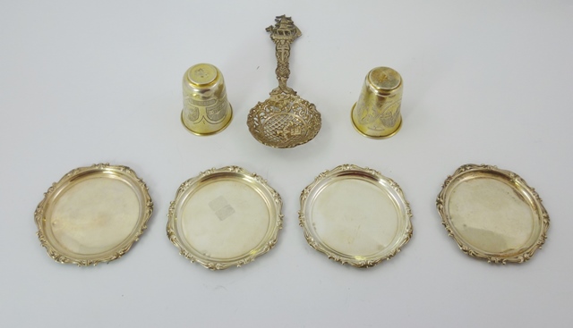 TWO 19TH CENTURY RUSSIAN SILVER VODKA TOTS, each fashioned as an inverted bell with a rolled rim