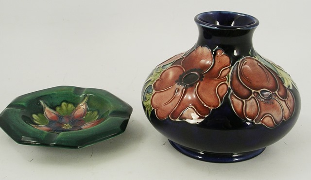 A MOORCROFT EARTHENWARE ASHTRAY, octagonal with anemone centre, 11cm high, together with another