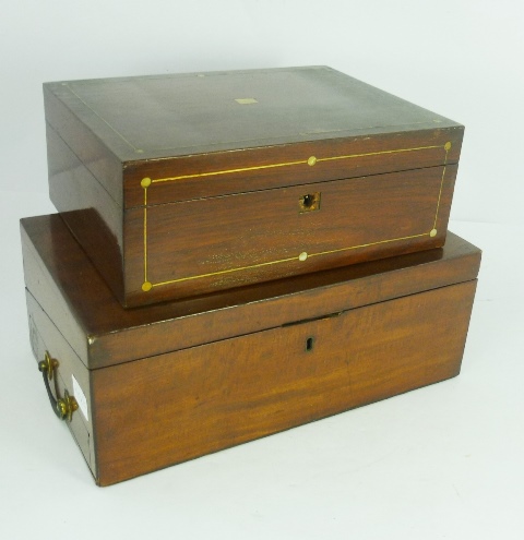 A VICTORIAN MAHOGANY WRITING SLOPE of typical box form, opening to reveal a part fitted interior,