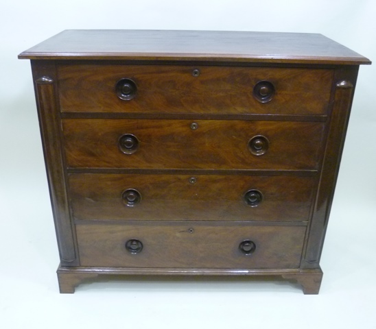 A 19TH CENTURY MAHOGANY FINISHED CHEST, having plain rectangular top over four full width drawers,