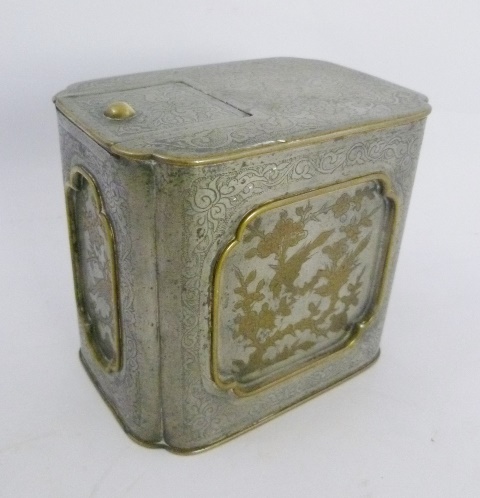 A 20TH CENTURY ORIENTAL PEWTER TEA CADDY having four recessed panels around, inlaid with birds and