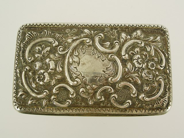 ALEXANDER STRACHAN A GEORGE III SILVER RECTANGULAR SNUFF BOX, having repousse worked top and sides