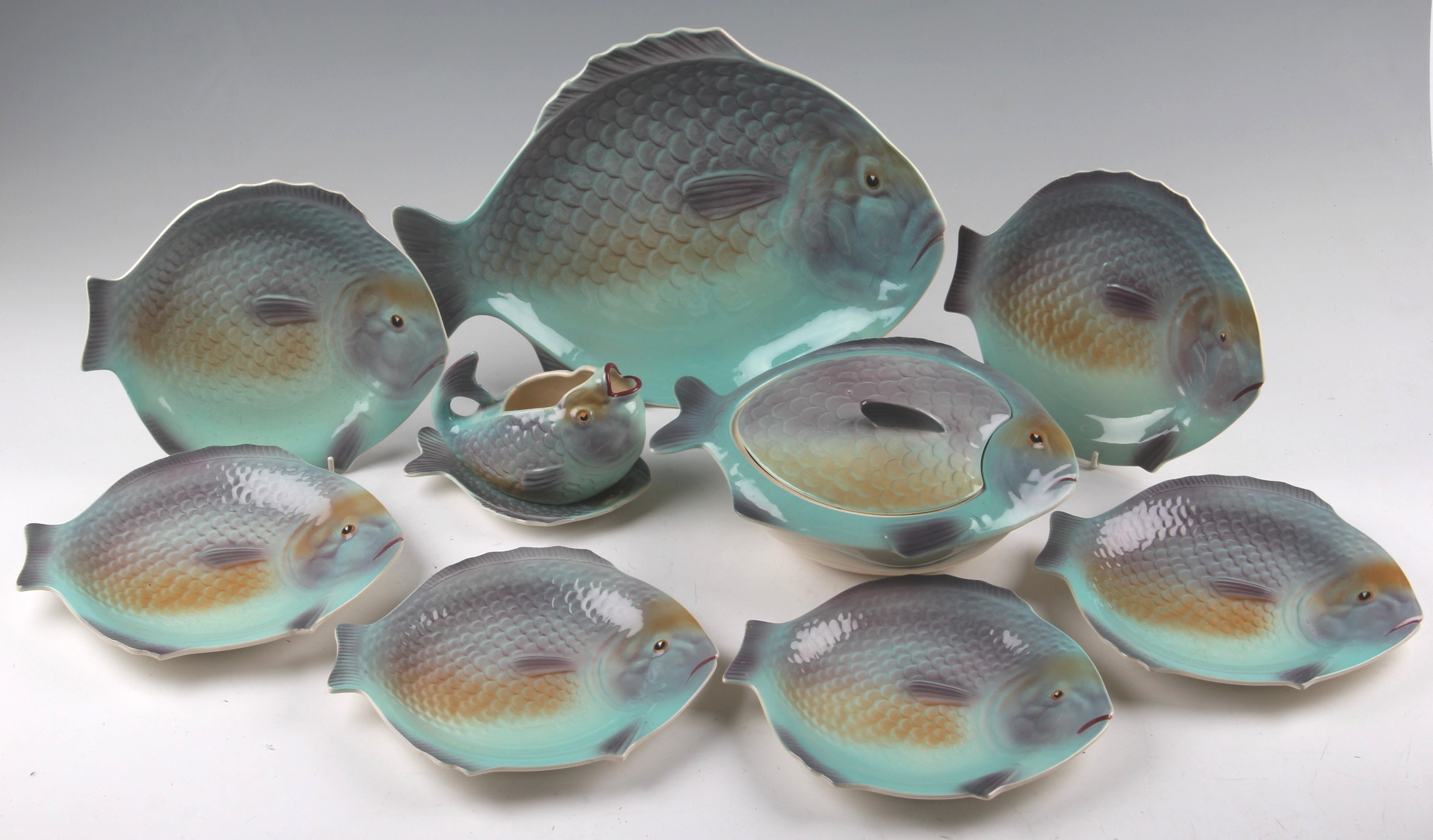 A Shorter & Son dinner service relief moulded in the form of fish to include lidded tureen A/F,