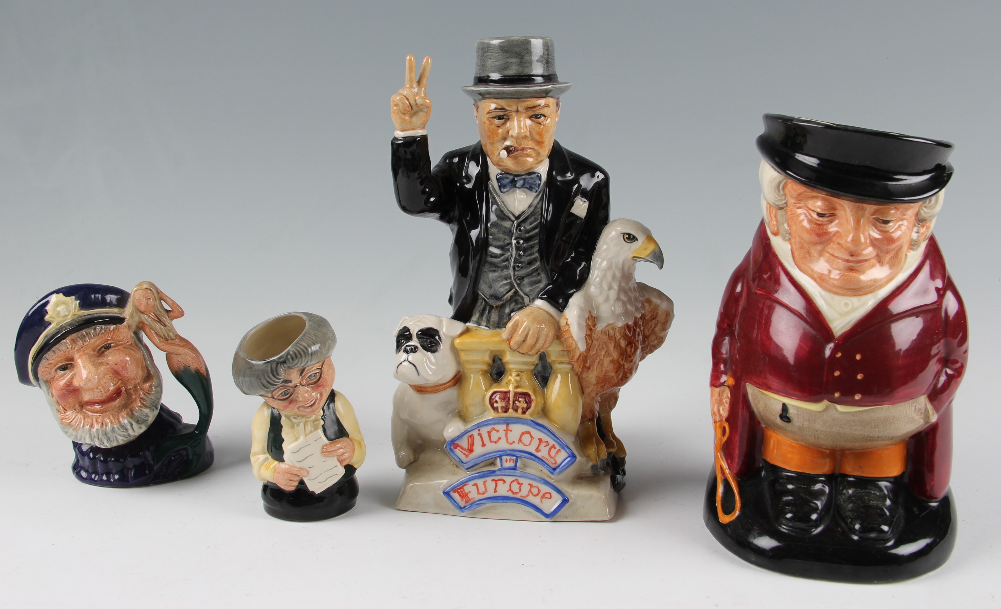 A group of four character and toby jugs to include Kevin Francis Winston Churchill 50th Anniversary