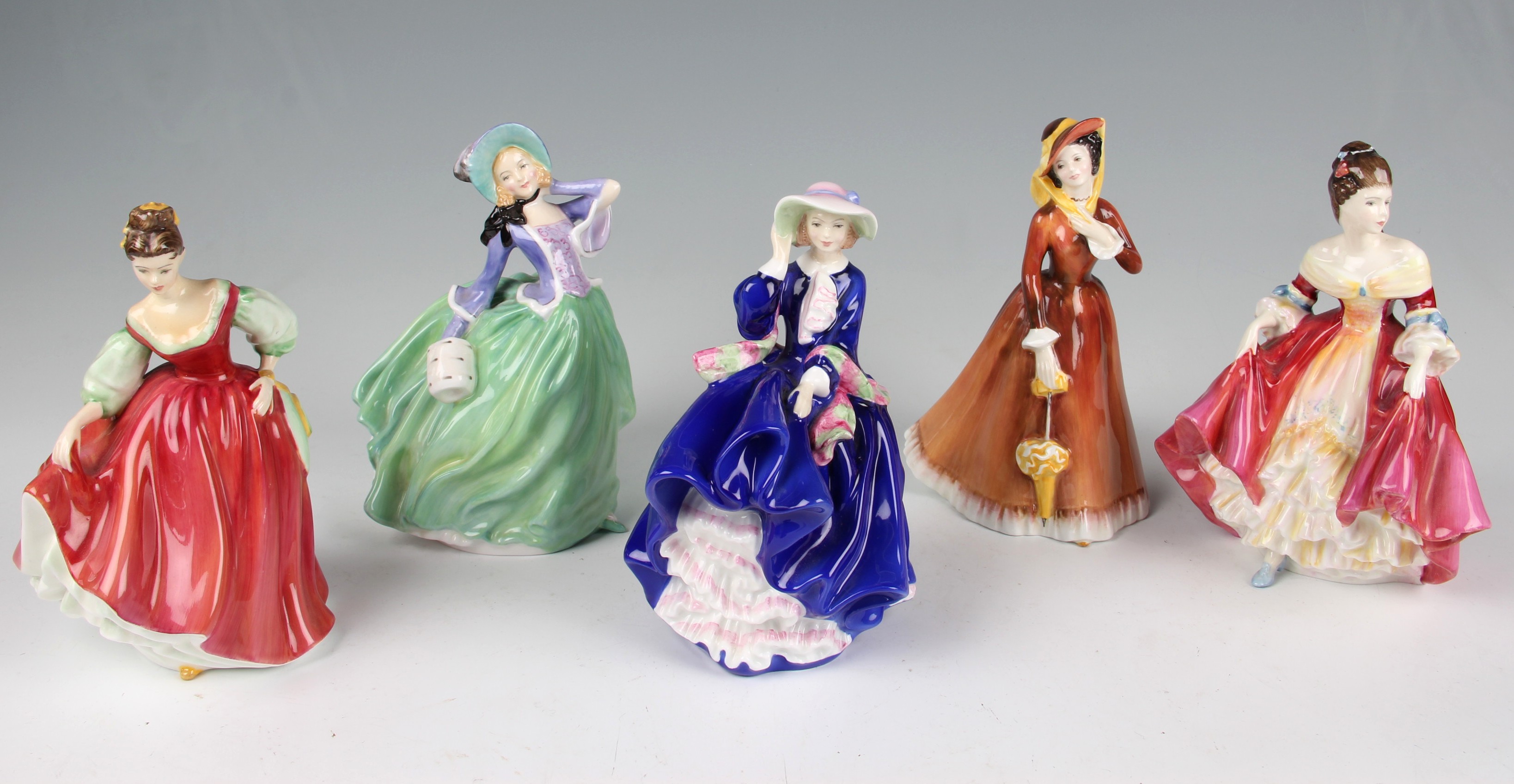 Five Royal Doulton figures, Autumn breezes HN 1913, Top o` the hill HN 3735 limited edition 1639 of