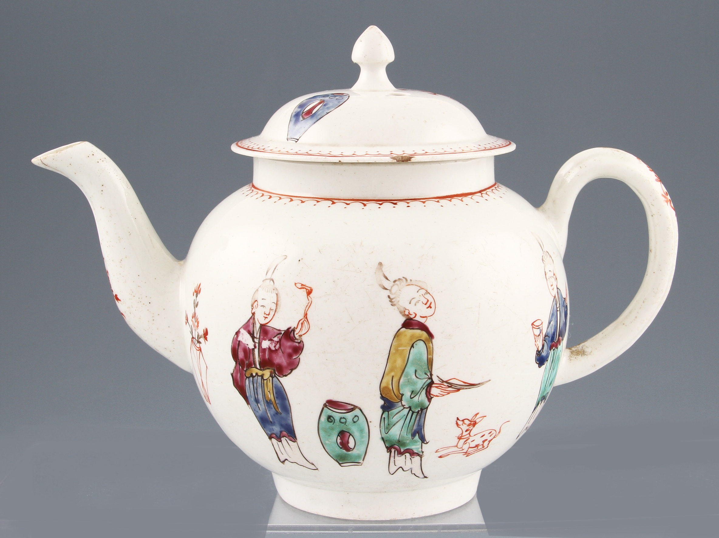 A Worcester first period 18th Century porcelain teapot c.1770, the ovoid footed body enamelled with