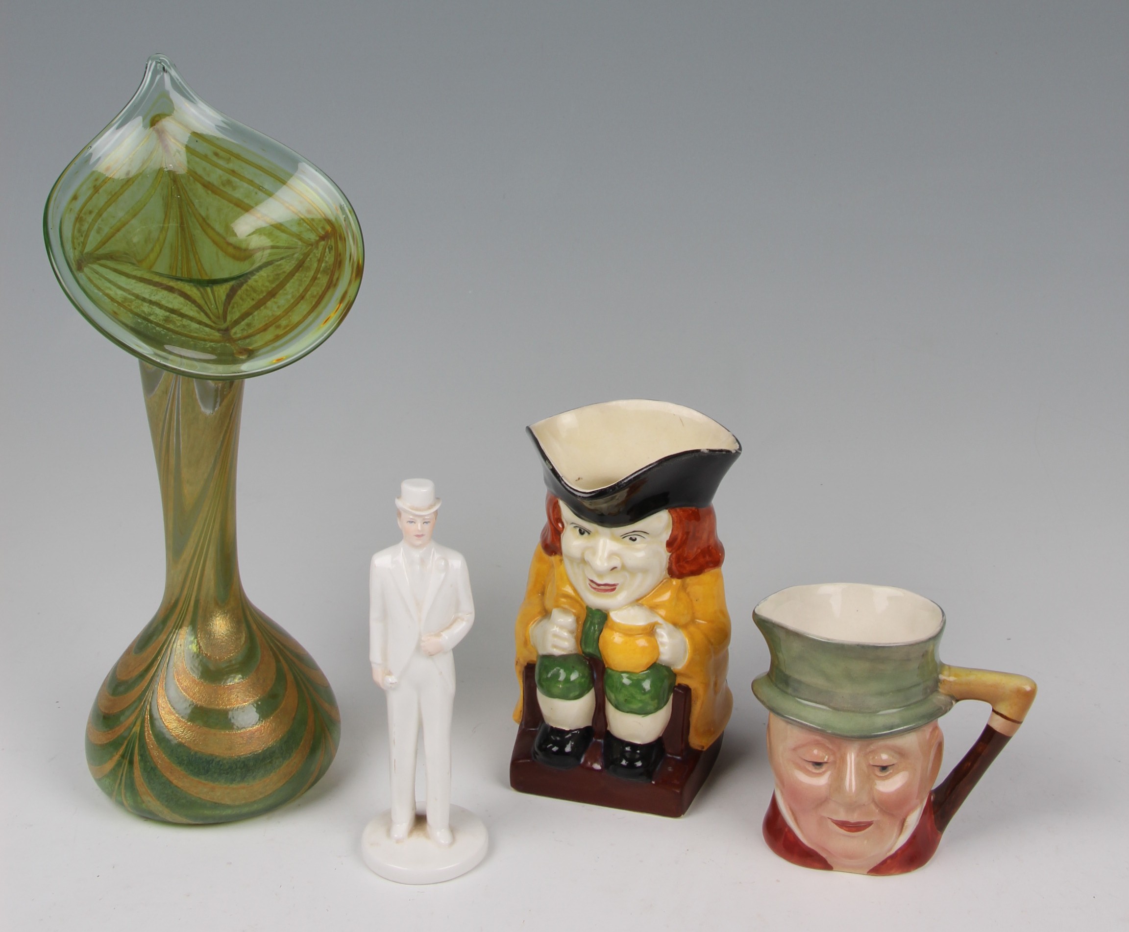 A group of four items to include an iridescent studio glass jack in the pulpit vase, unmarked,