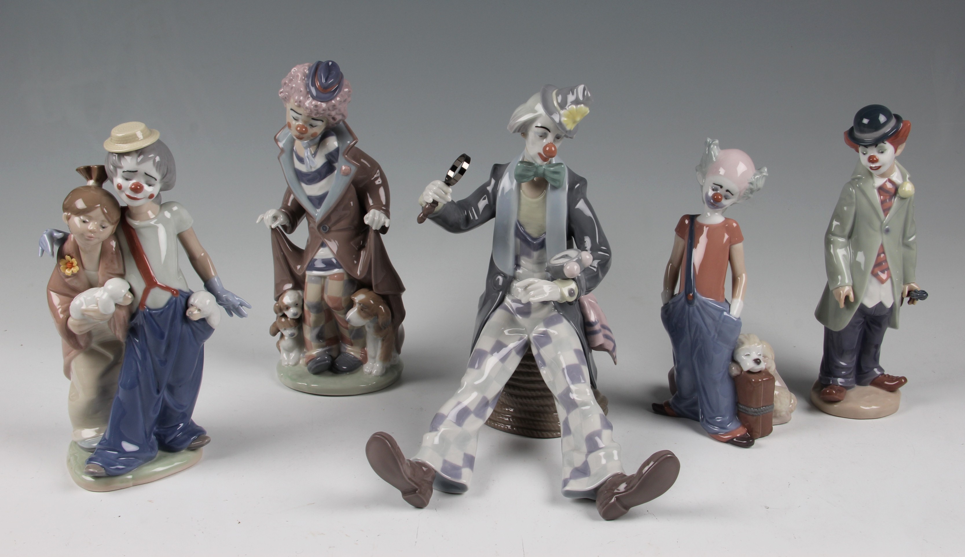 A parcel lot of five boxed Lladro figures of clowns, to include Pals forever 7686 Lladro Society