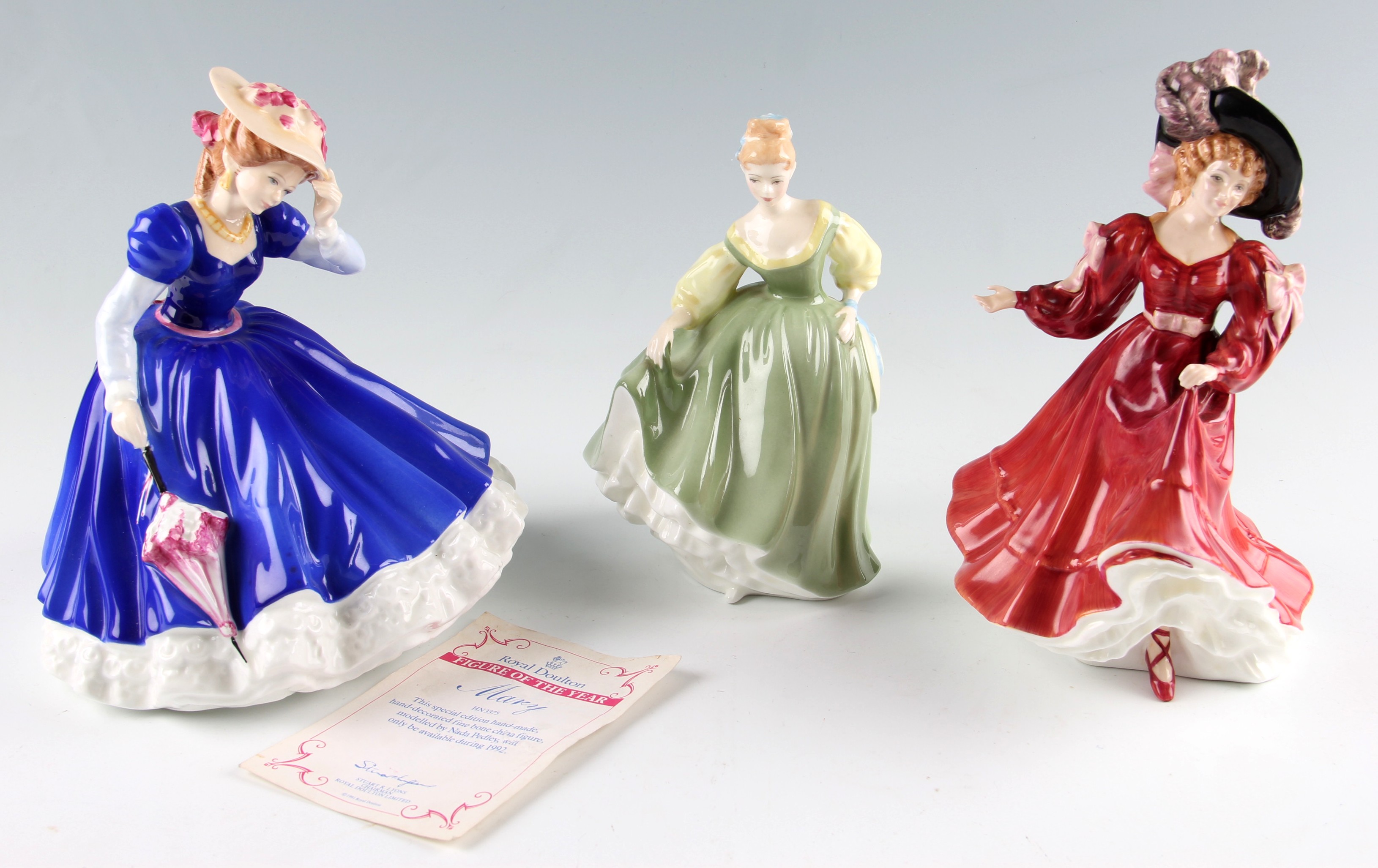 Three Royal Doulton figures to include Fair Lady HN 2193 by P Davies, Mary figure of the year 1992