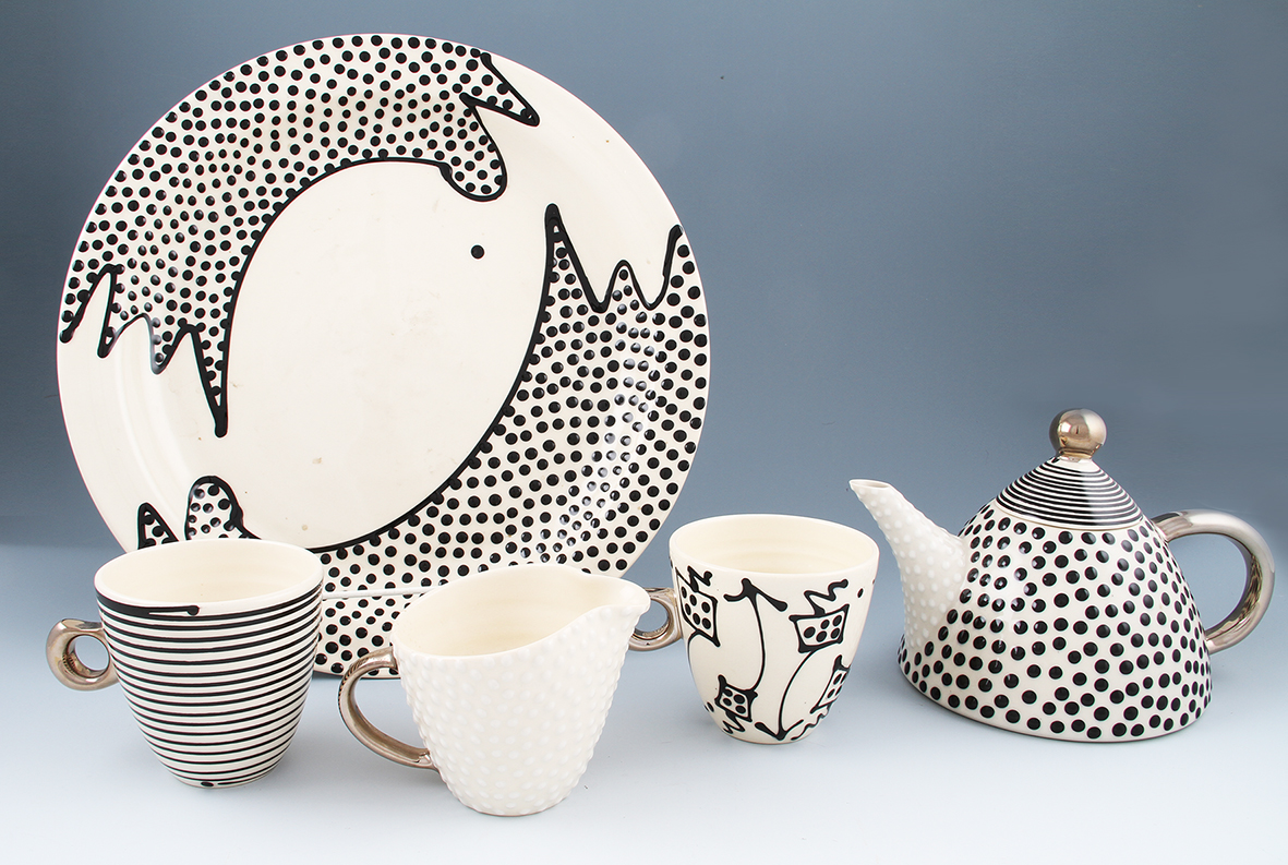 Five pieces of studio pottery by Mark Dally, all with slip decoration, to include dotty pattern