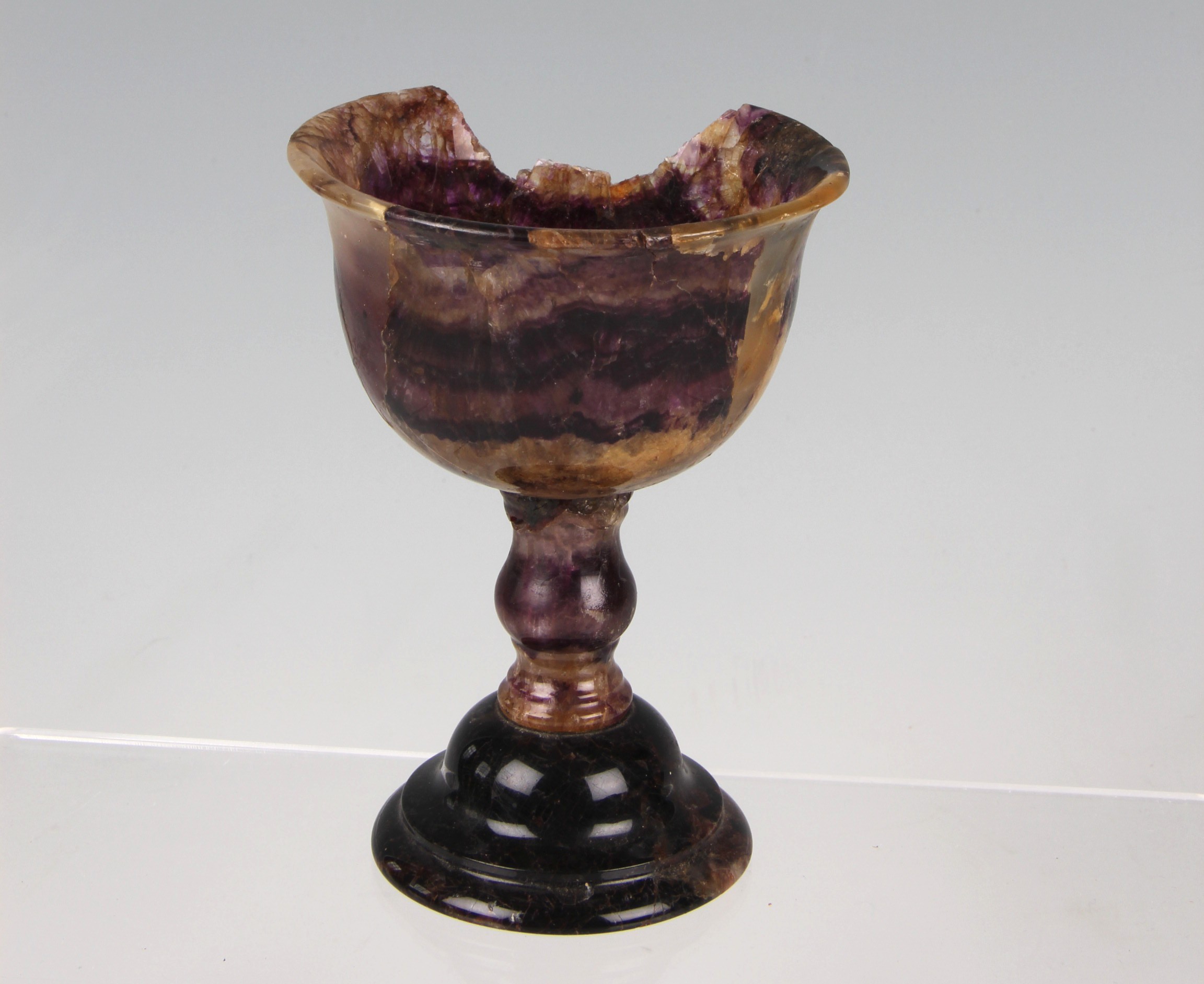 A 19th Century blue john or Derbyshire spar footed goblet, approx. 12.5cm high, A/F.