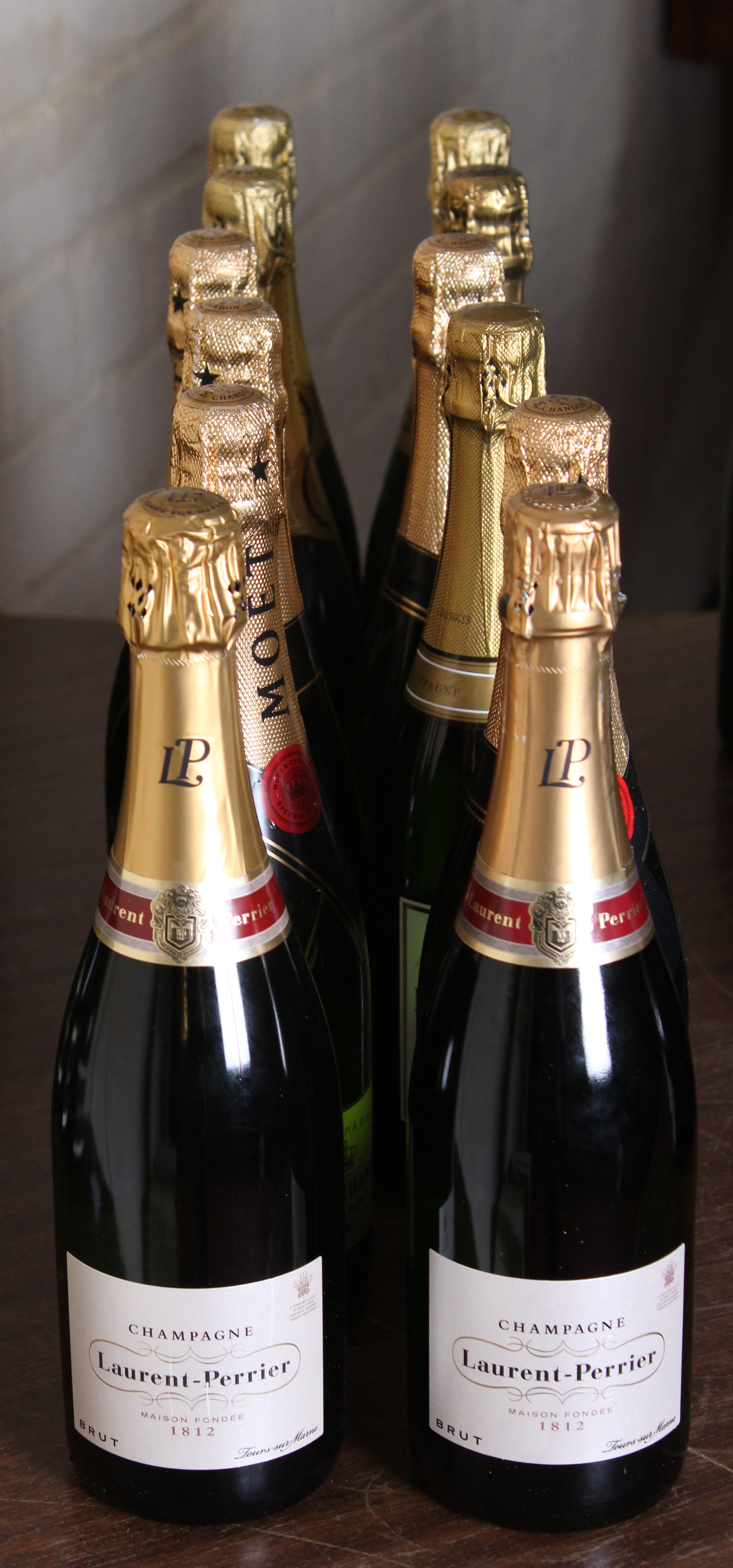 *A parcel lot of champagne to include two bottles of Laurent-Perrier Brut, five bottles of Moet et